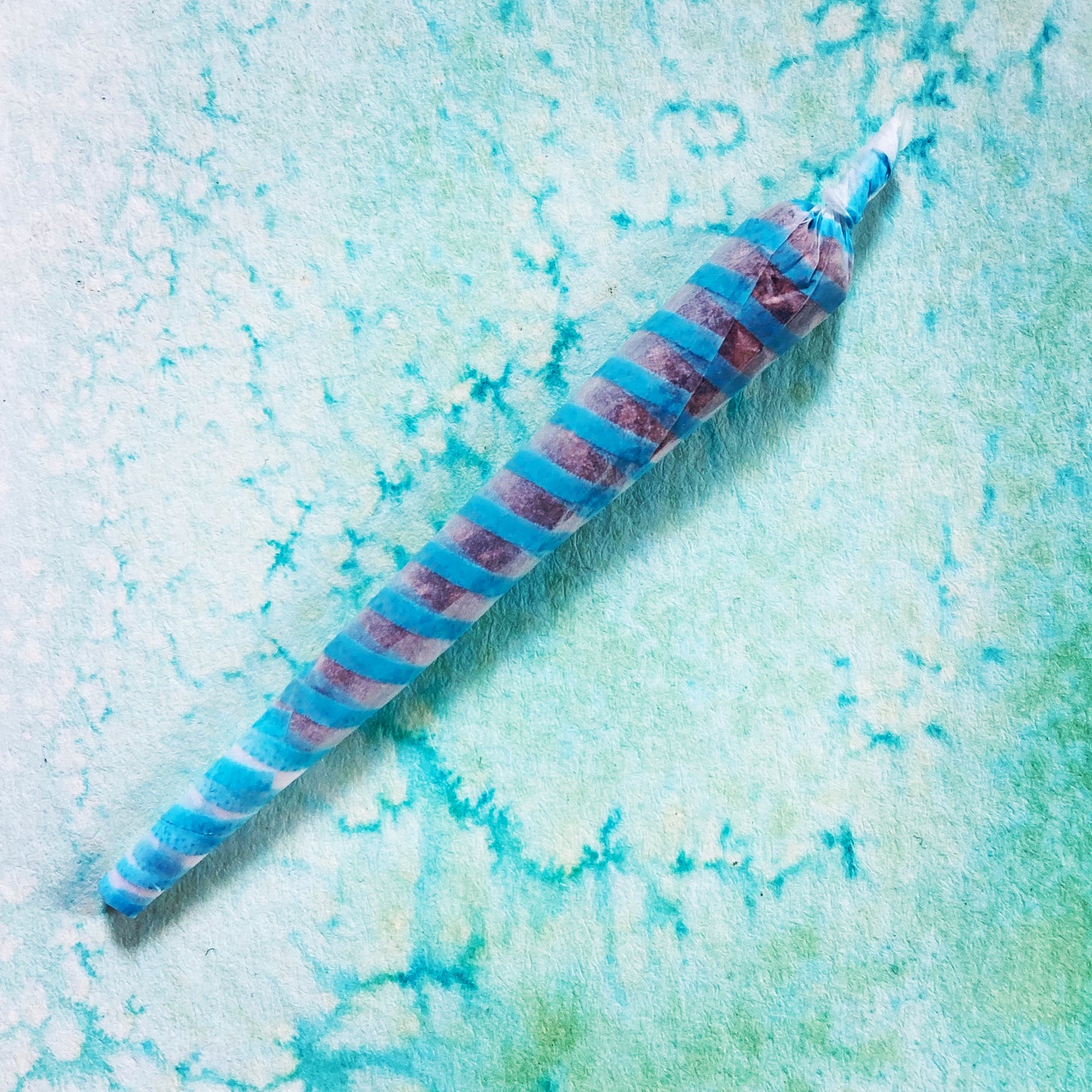 The Classic Rolling Papers: blue striped rolling papers. These designer rolling papers are girly, pretty, vegan, cute, cool, standard size, high quality, even burn, natural dyes, best tasting, slow burn.