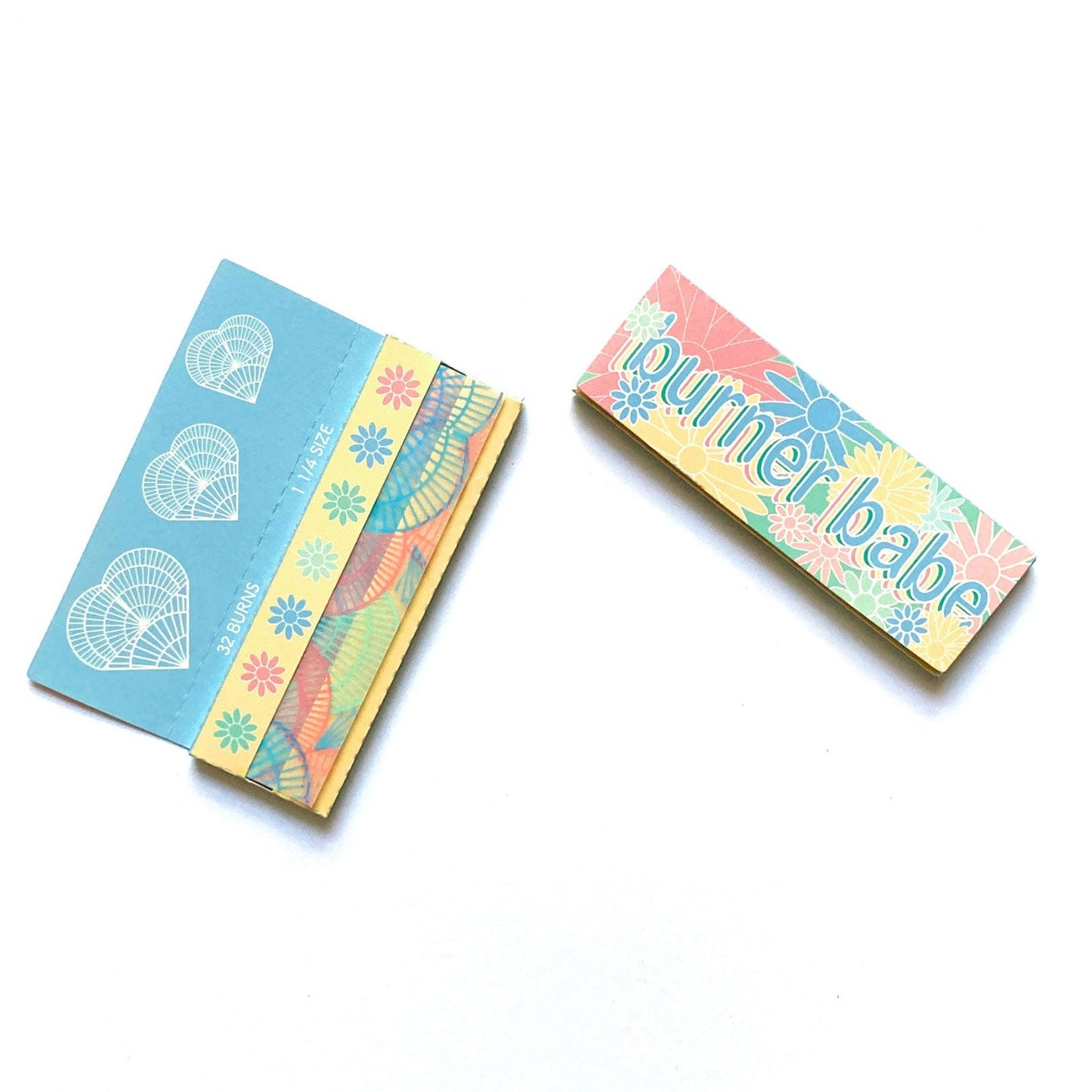 The Heartbreaker Papers, set of 10: spiral printed rolling papers. These designer rolling papers are girly, pretty, vegan, cute, cool, standard size, high quality, even burn, natural dyes, best tasting, slow burn.