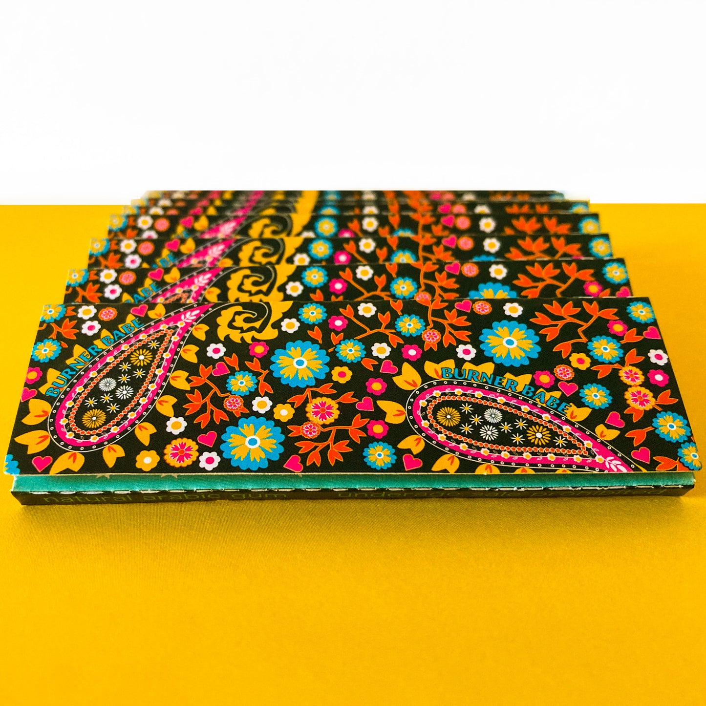 The Starlit Papers, set of 10: star, moon, galaxy patterned rolling papers. These designer rolling papers are girly, pretty, vegan, cute, cool, standard size, high quality, even burn, natural dyes, best tasting, slow burn.