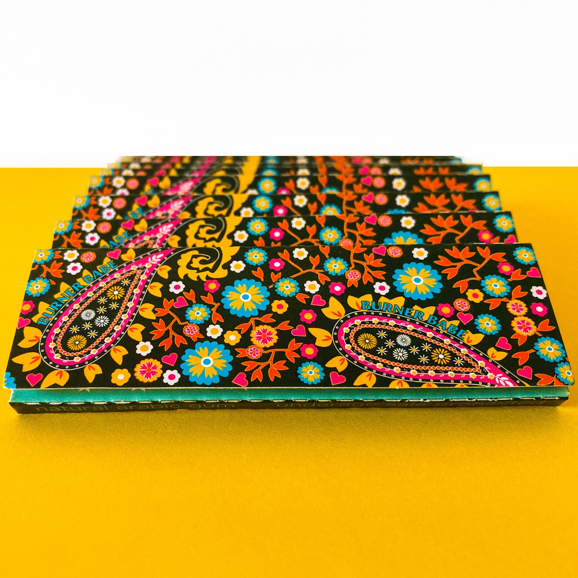 The Starlit Papers, set of 10: star, moon, galaxy patterned rolling papers. These designer rolling papers are girly, pretty, vegan, cute, cool, standard size, high quality, even burn, natural dyes, best tasting, slow burn.