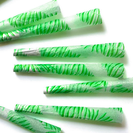 The Flaunt Cones, set of 8: leaf, frond patterned pre-rolled cones. These designer pre-rolled cones are girly, pretty, vegan, cute, cool, standard size, high quality, even burn, natural dyes, best tasting, slow burn.