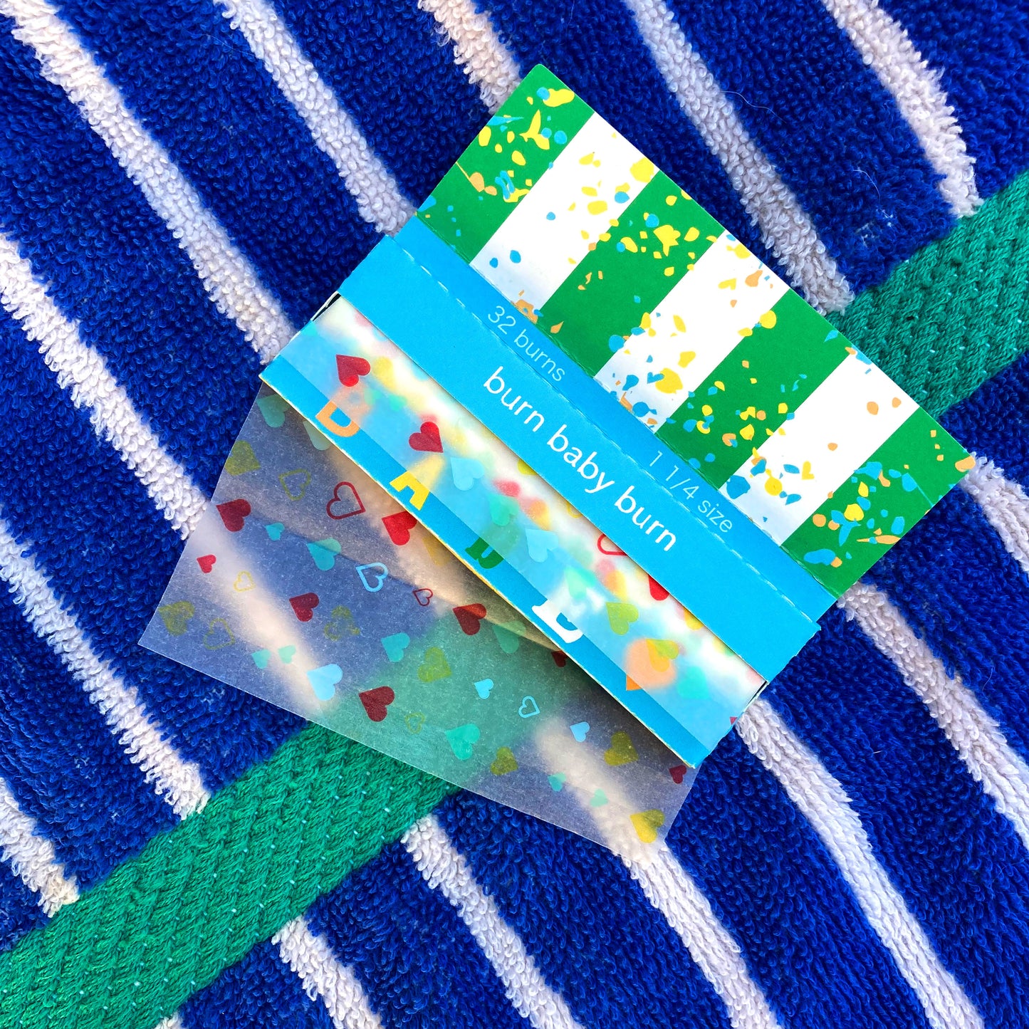 The (Ob)session Papers: heart adorned rolling papers. These designer rolling papers are girly, pretty, vegan, cute, cool, standard size, high quality, even burn, natural dyes, best tasting, slow burn.