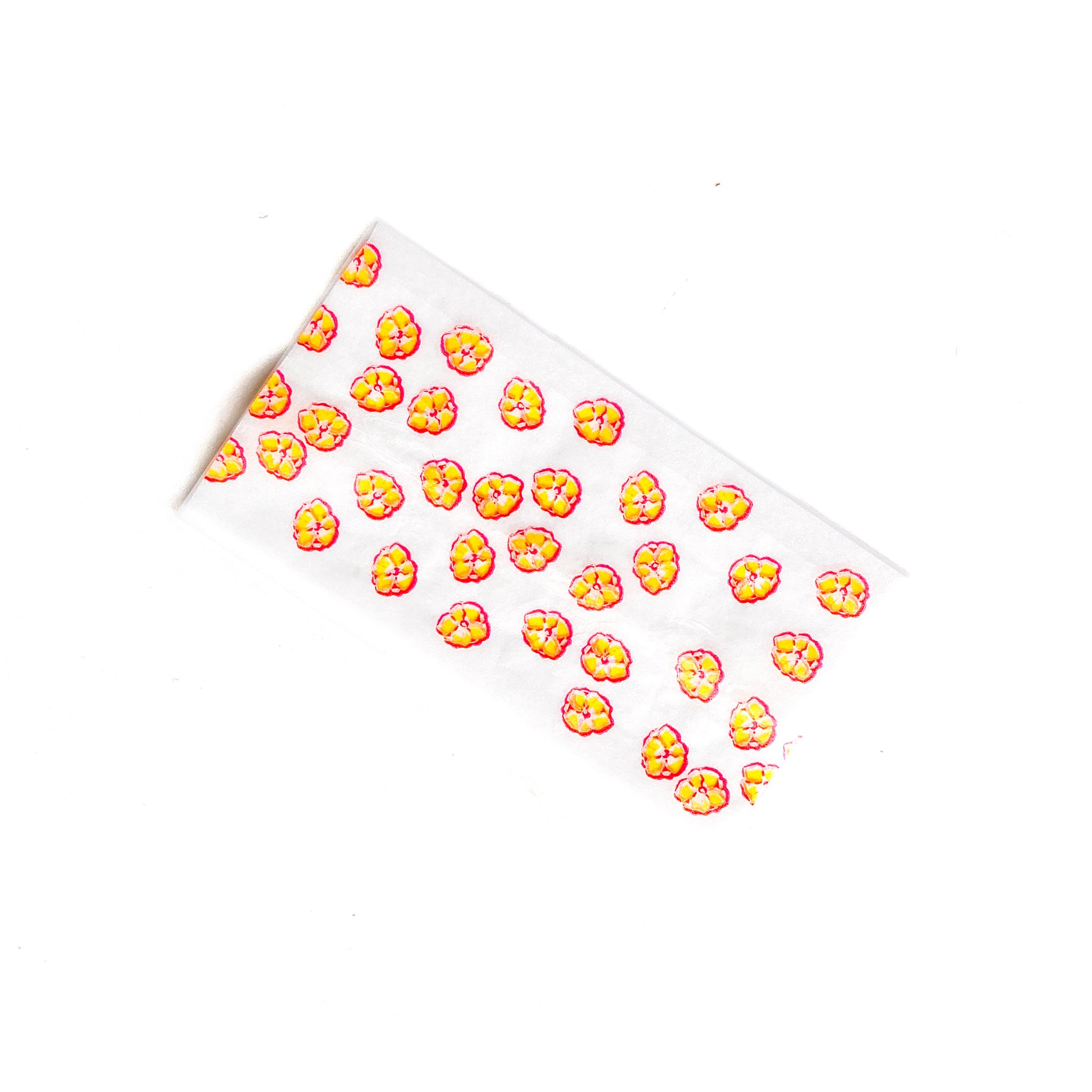 The Poppy Papers: yellow poppy printed papers. These designer rolling papers are girly, pretty, vegan, cute, cool, standard size, high quality, even burn, natural dyes, best tasting, slow burn.