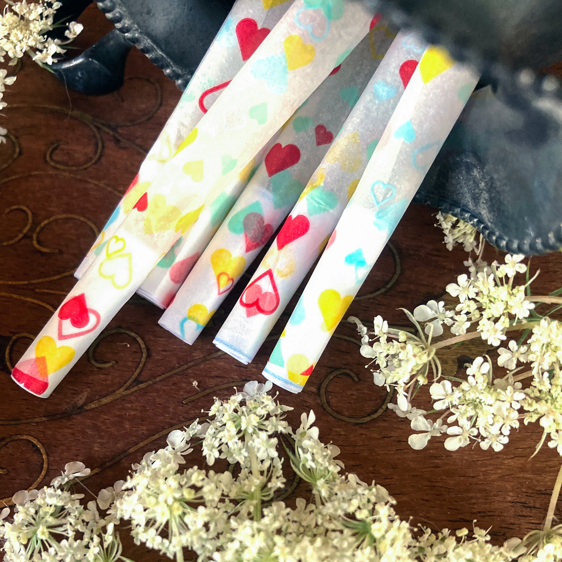 The (Ob)session Cones, set of 8: heart adorned pre-rolled cones. These designer pre-rolled cones are girly, pretty, vegan, cute, cool, standard size, high quality, even burn, natural dyes, best tasting, slow burn.