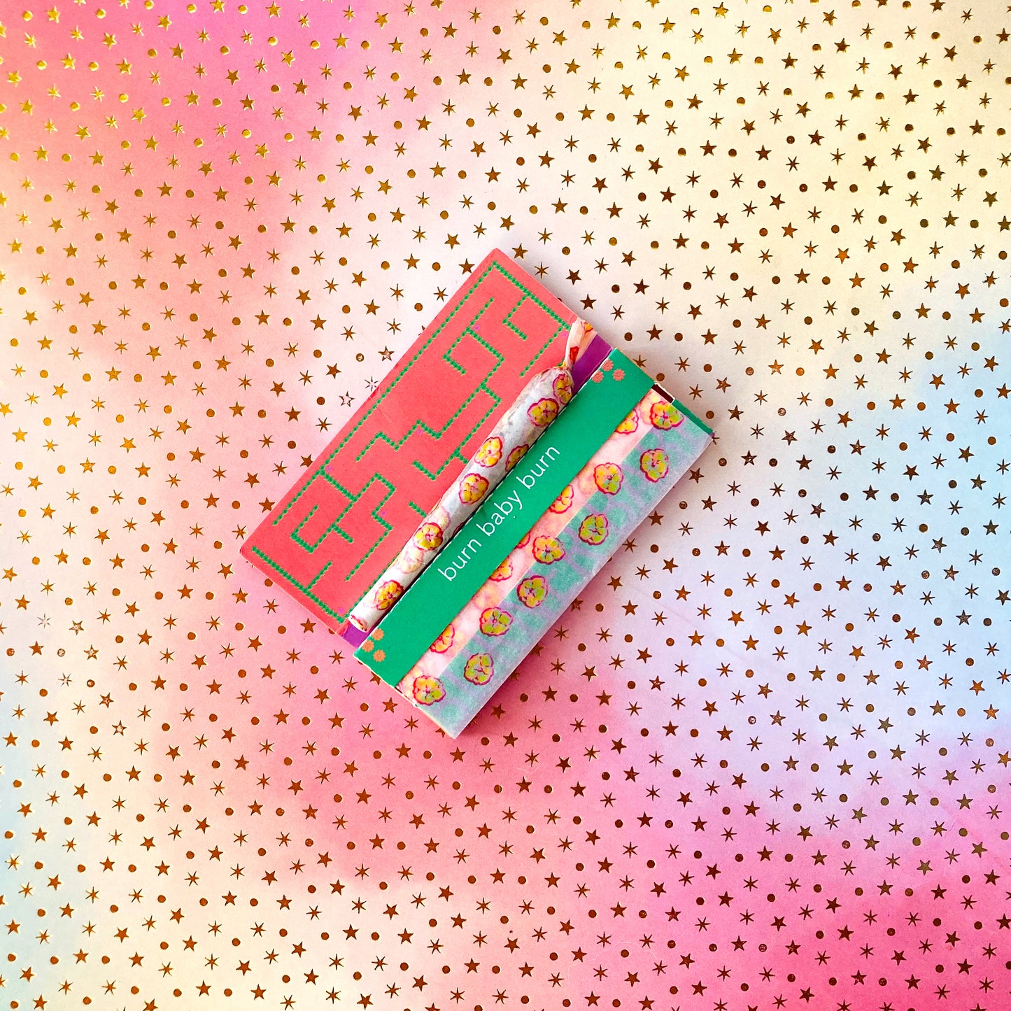 The Poppy Papers: yellow poppy printed papers. These designer rolling papers are girly, pretty, vegan, cute, cool, standard size, high quality, even burn, natural dyes, best tasting, slow burn.