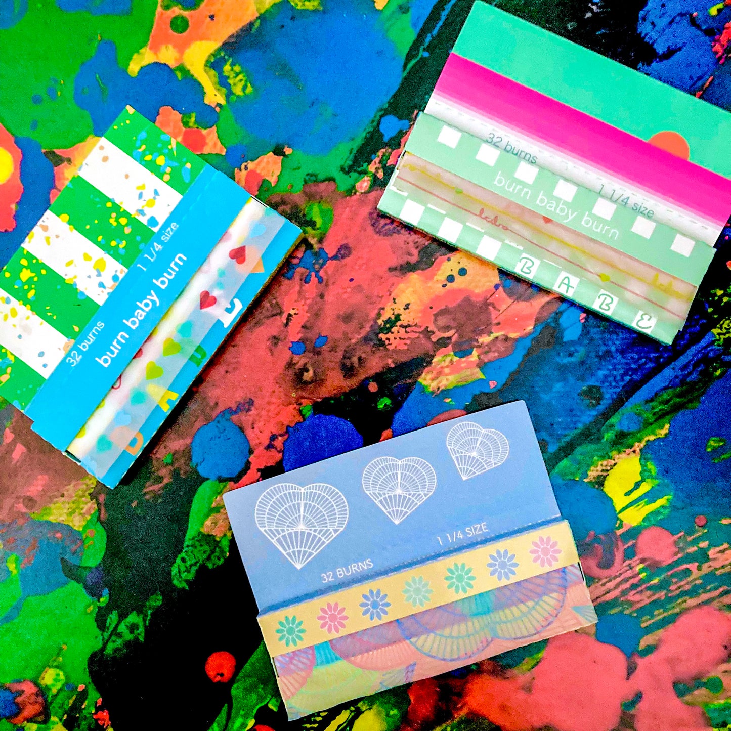 Set of 3 heart themed papers. These designer rolling papers are girly, pretty, vegan, cute, cool, standard size, high quality, even burn, natural dyes, best tasting, slow burn.