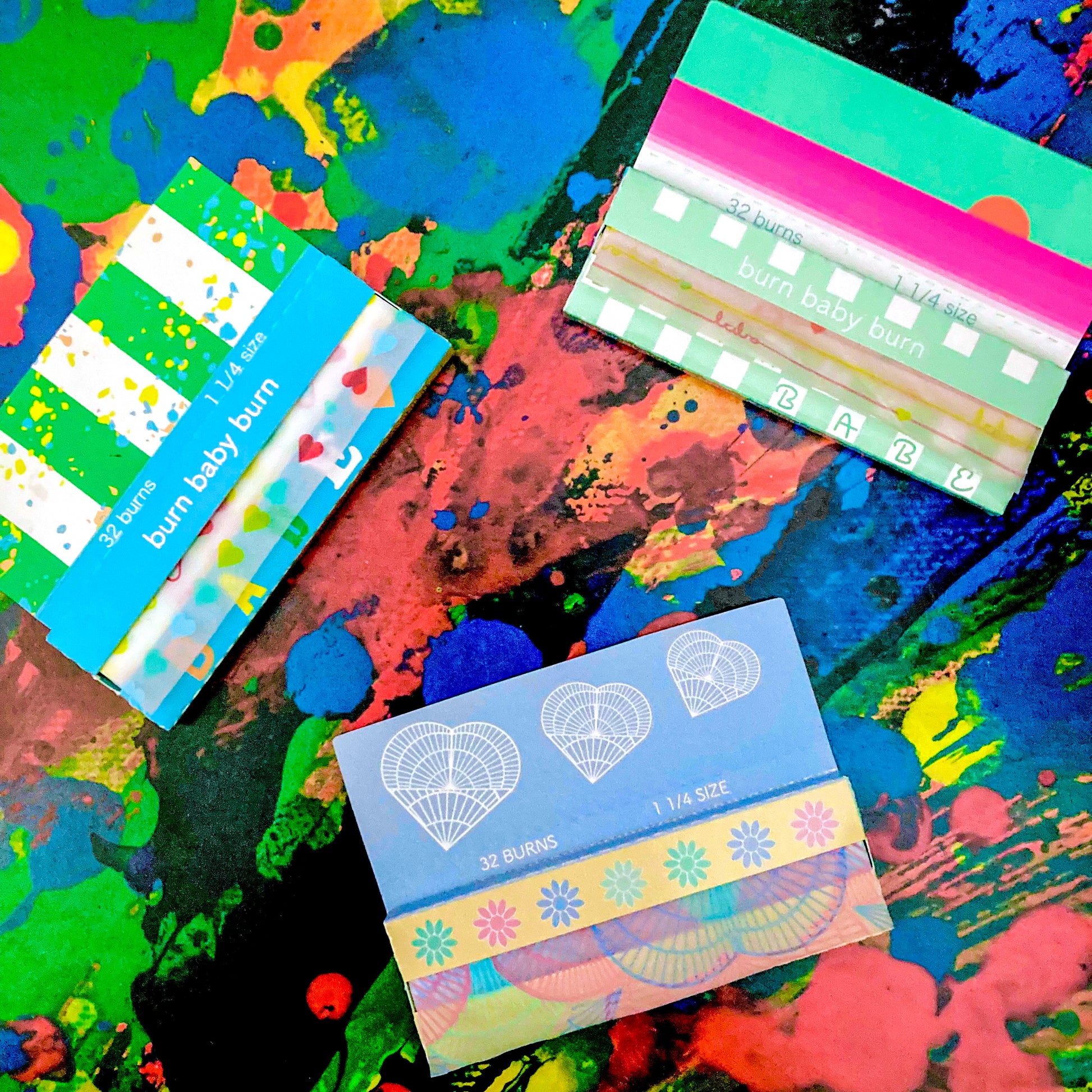 Set of 3 heart themed papers. These designer rolling papers are girly, pretty, vegan, cute, cool, standard size, high quality, even burn, natural dyes, best tasting, slow burn.