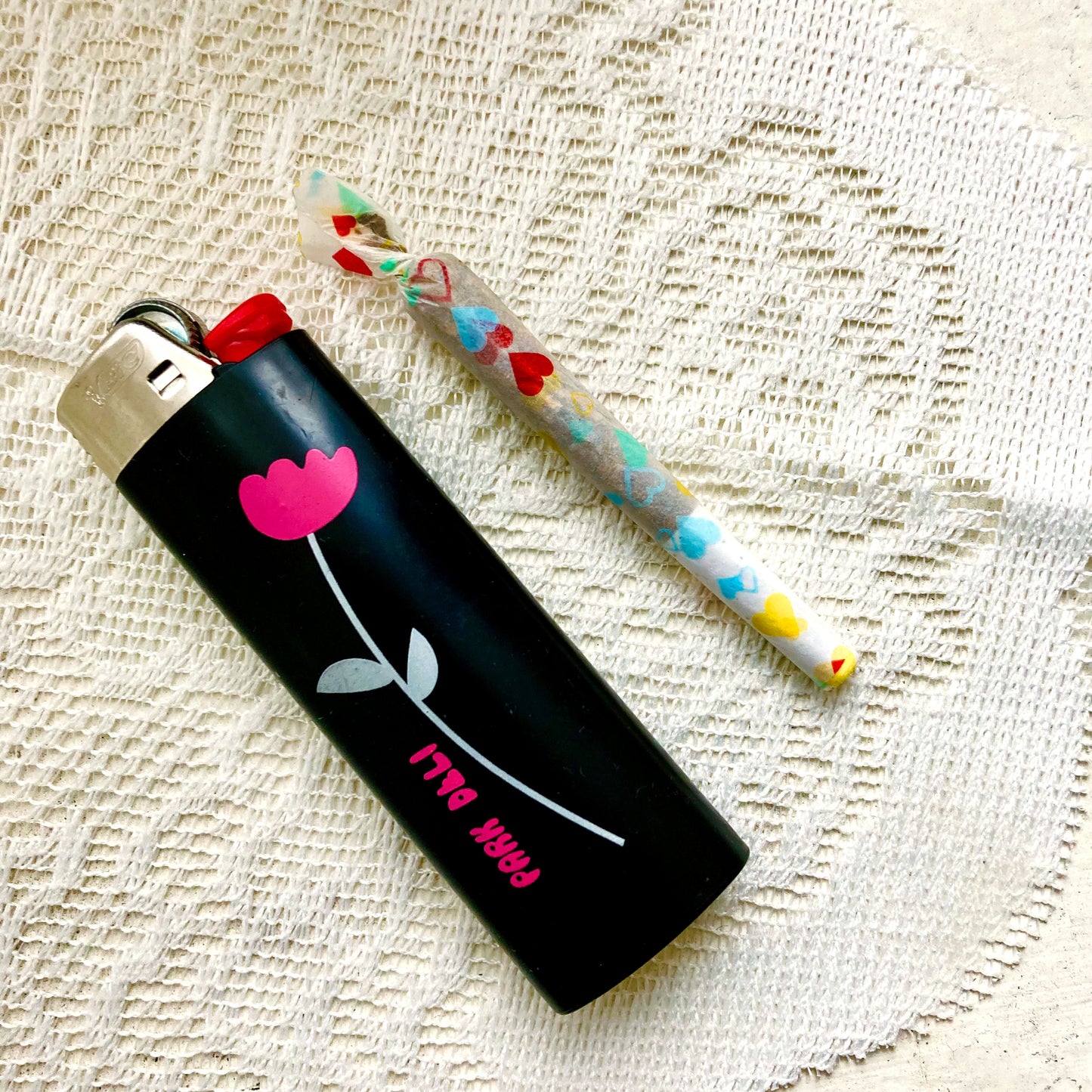 The (Ob)session Papers, set of 10: heart adorned rolling papers. These designer rolling papers are girly, pretty, vegan, cute, cool, standard size, high quality, even burn, natural dyes, best tasting, slow burn.