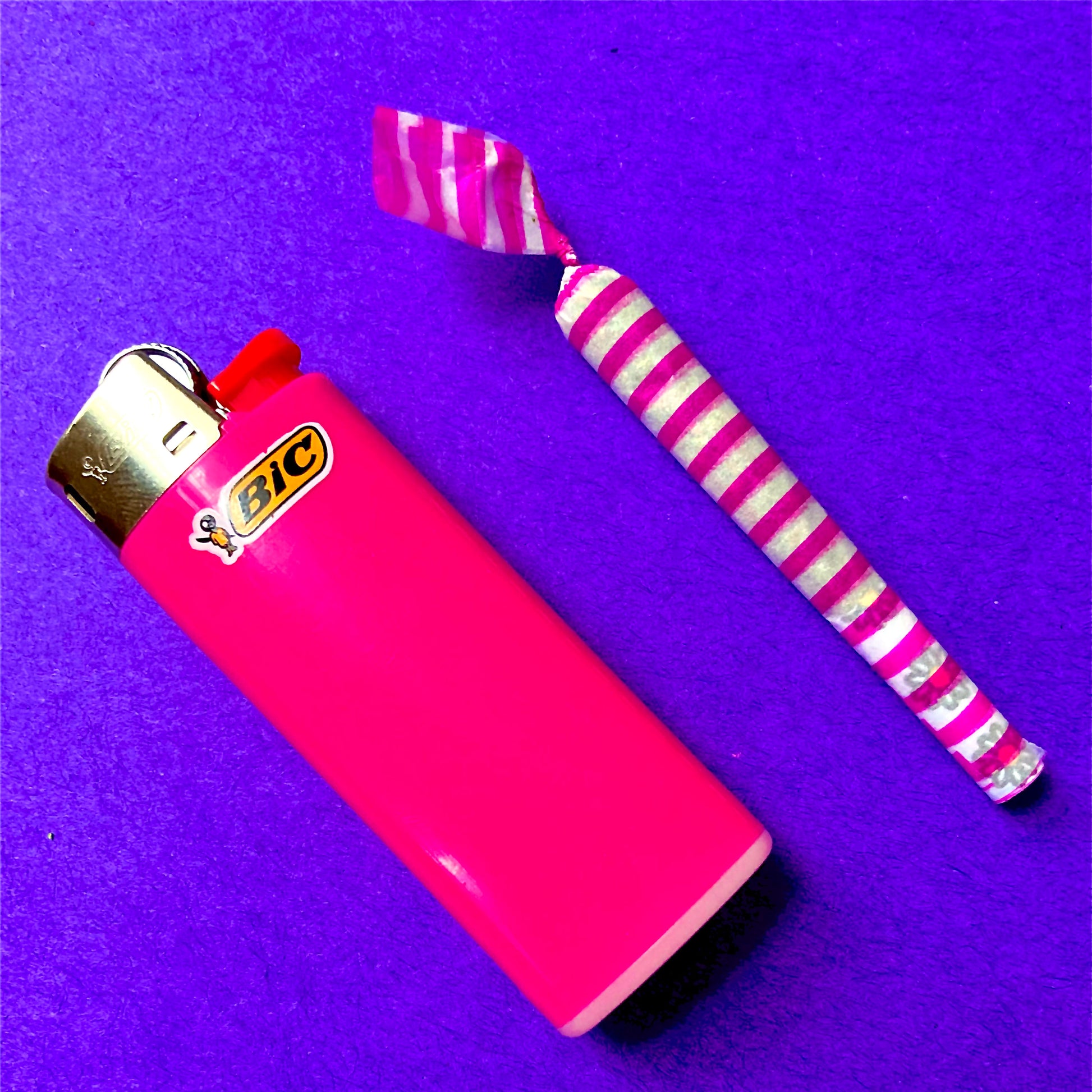 The Poseur Papers: magenta striped rolling papers. These designer rolling papers are girly, pretty, vegan, cute, cool, standard size, high quality, even burn, natural dyes, best tasting, slow burn.