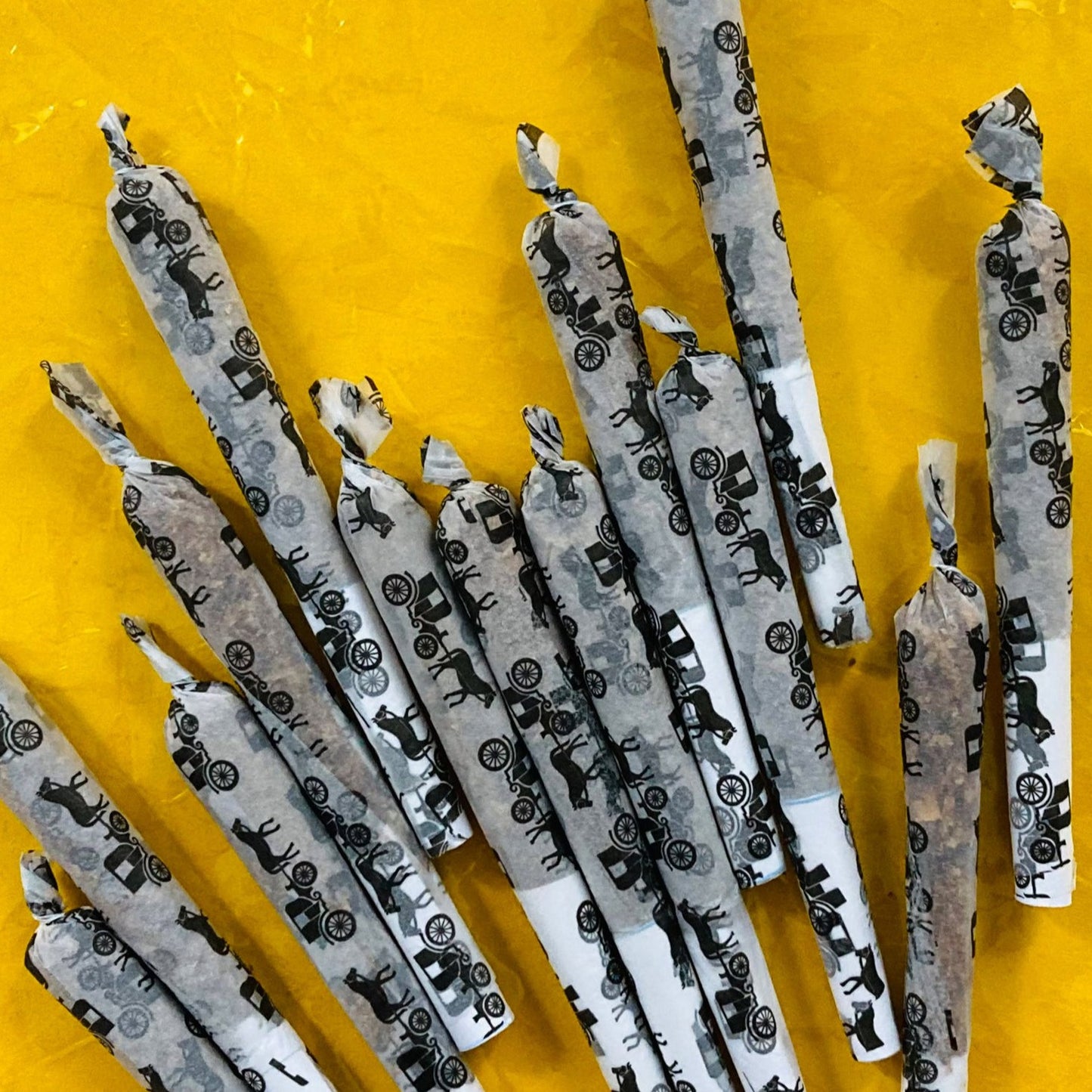 The Carriage Papers, set of 10: horse and carriage printed rolling papers. These designer papers are girly, pretty, vegan, cute, cool, standard size, high quality, even burn, natural dyes, best tasting, slow burn.