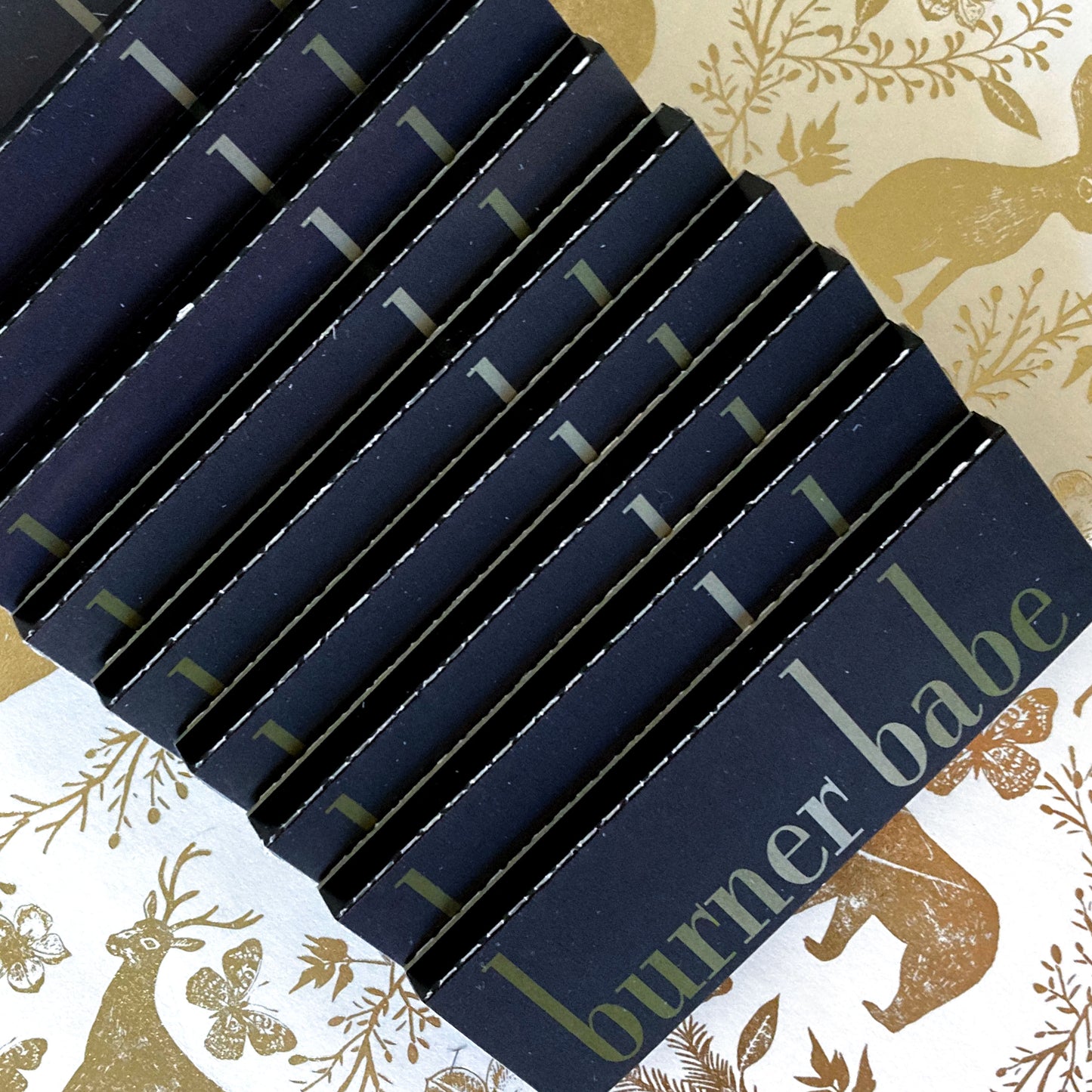 The Carriage Papers, set of 10: horse and carriage printed rolling papers. These designer papers are girly, pretty, vegan, cute, cool, standard size, high quality, even burn, natural dyes, best tasting, slow burn.