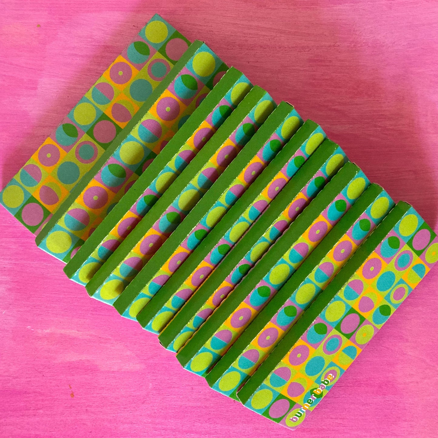 The Chick Lick Papers, set of 10: popsicle patterned rolling papers. These designer rolling papers are girly, pretty, vegan, cute, cool, standard size, high quality, even burn, natural dyes, best tasting, slow burn.