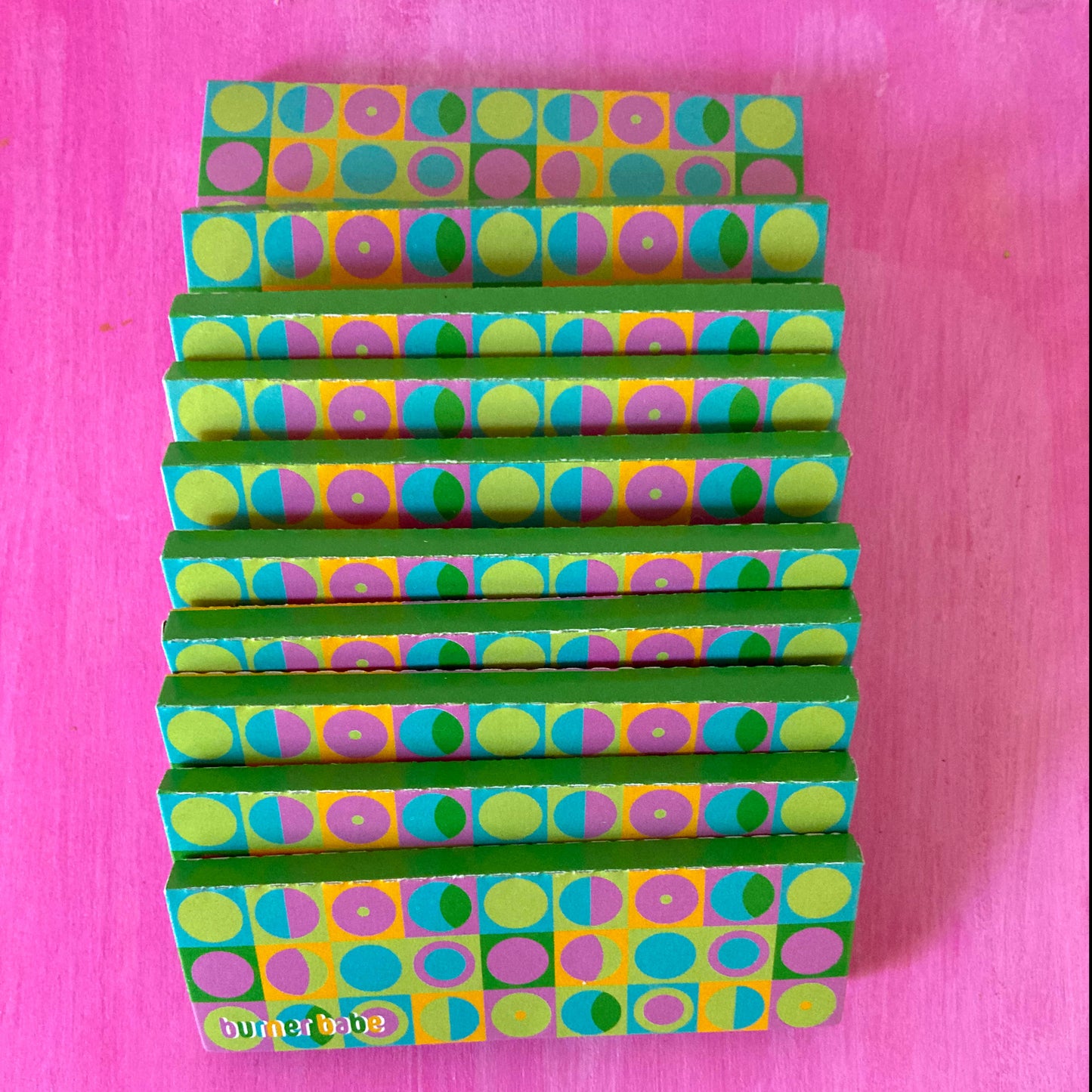 The Chick Lick Papers, set of 10: popsicle patterned rolling papers. These designer rolling papers are girly, pretty, vegan, cute, cool, standard size, high quality, even burn, natural dyes, best tasting, slow burn.