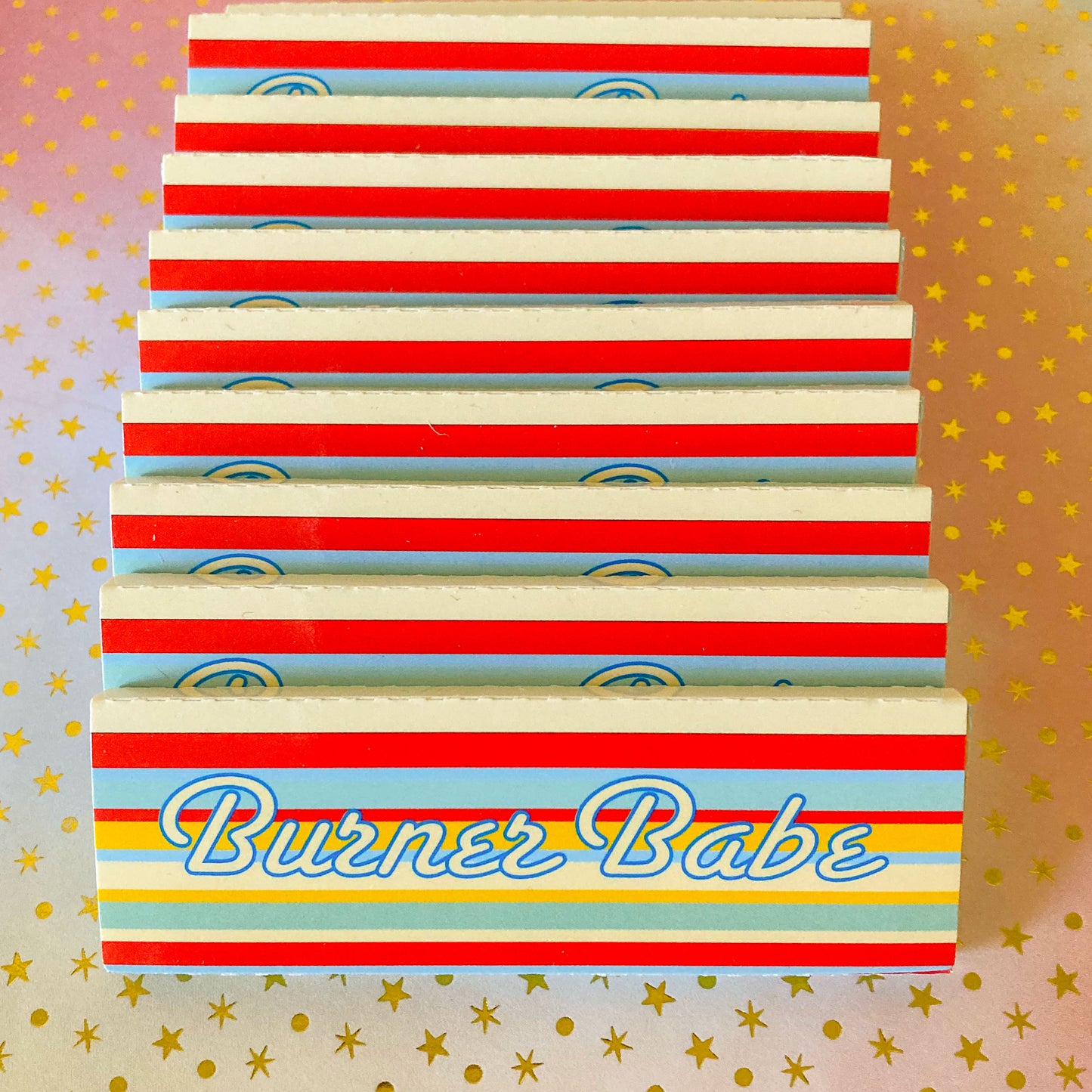 The Classic Rolling Papers, set of 10: blue striped rolling papers. These designer rolling papers are girly, pretty, vegan, cute, cool, standard size, high quality, even burn, natural dyes, best tasting, slow burn.