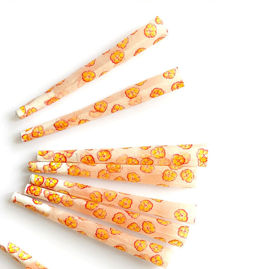The Poppy Cones, set of 8 pre-rolled cones: yellow poppy printed cones. These designer pre-rolled cones are girly, pretty, vegan, cute, cool, standard size, high quality, even burn, natural dyes, best tasting, slow burn.