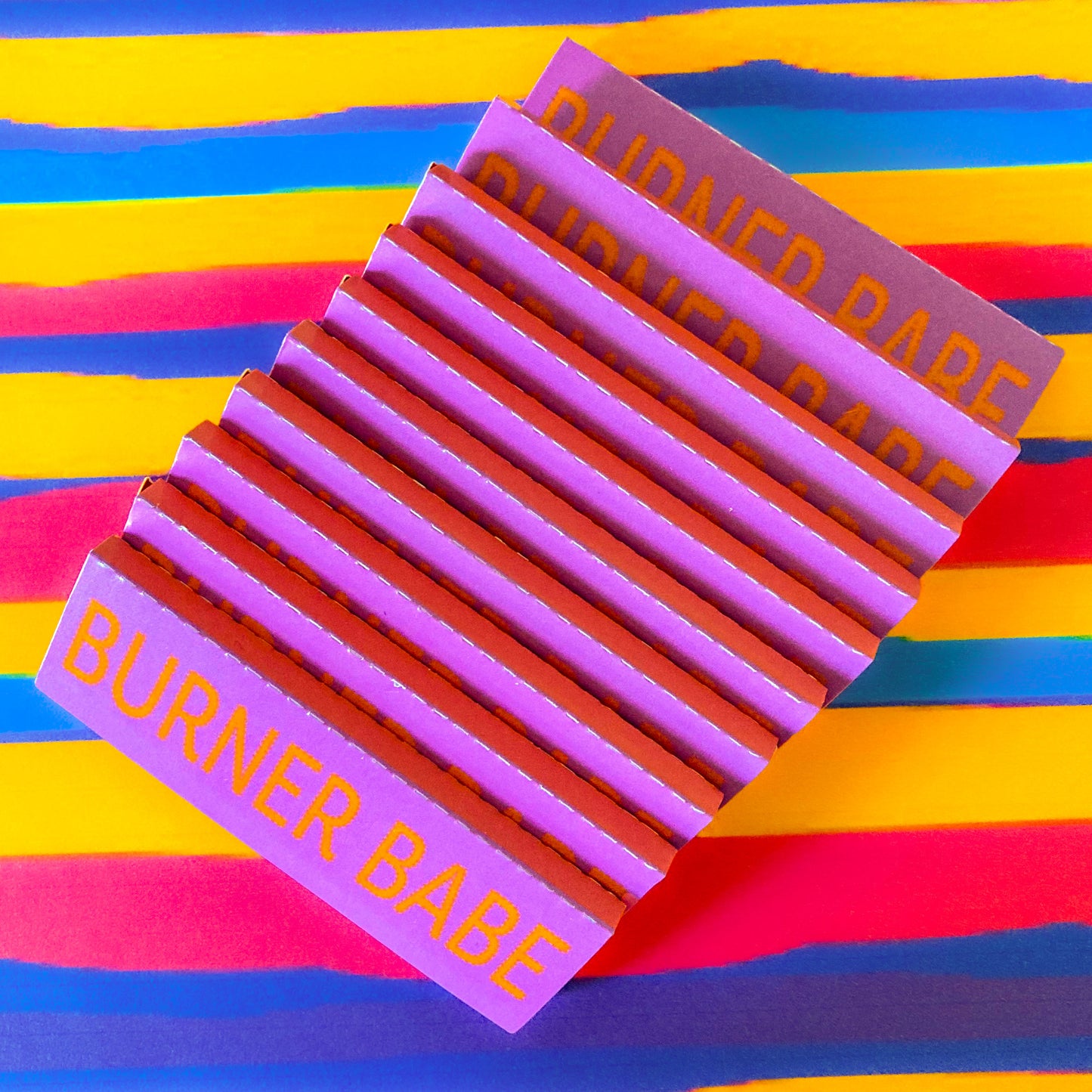 The Poppy Papers, set of 10: yellow poppy printed papers. These designer rolling papers are girly, pretty, vegan, cute, cool, standard size, high quality, even burn, natural dyes, best tasting, slow burn.