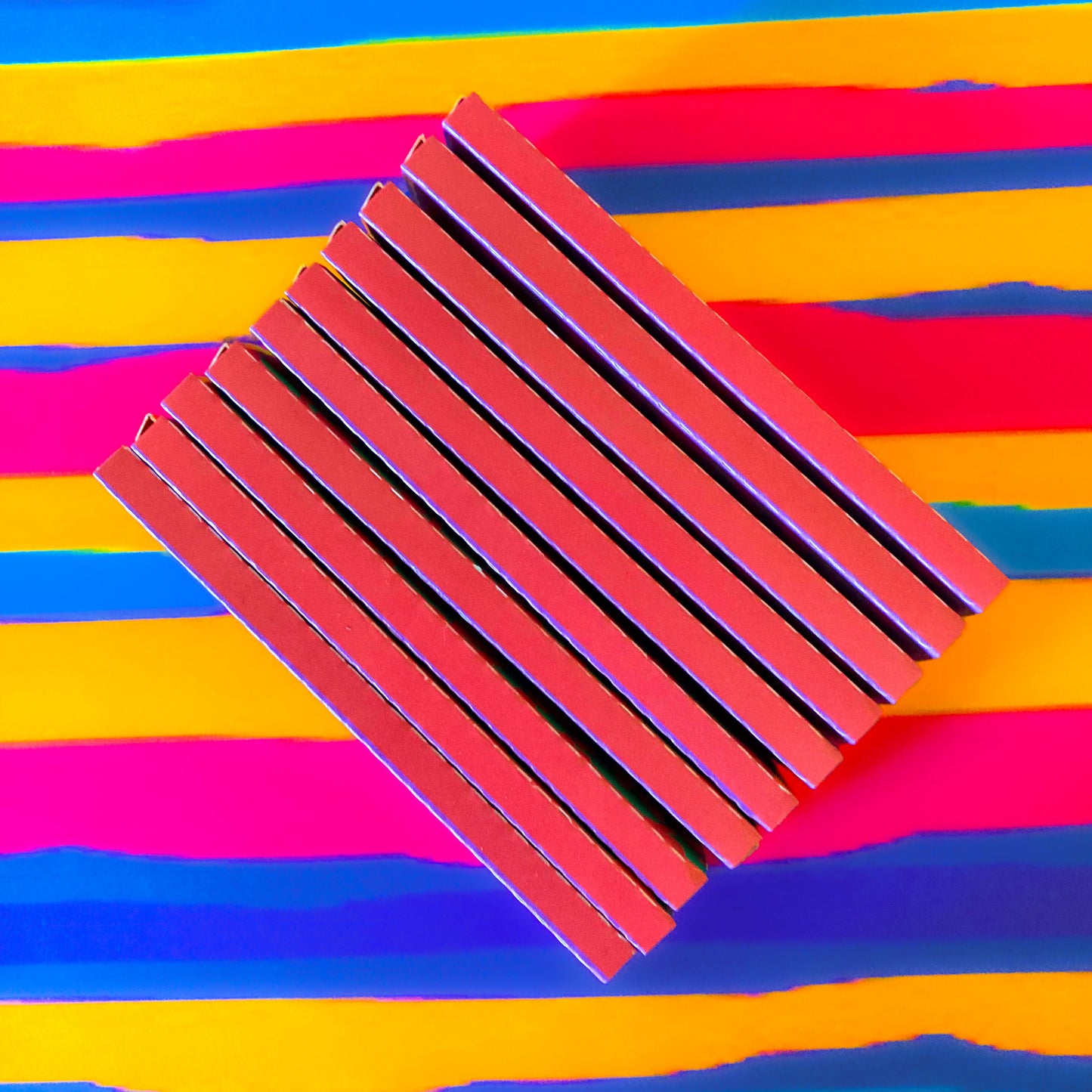 The Poppy Papers, set of 10: yellow poppy printed papers. These designer rolling papers are girly, pretty, vegan, cute, cool, standard size, high quality, even burn, natural dyes, best tasting, slow burn.