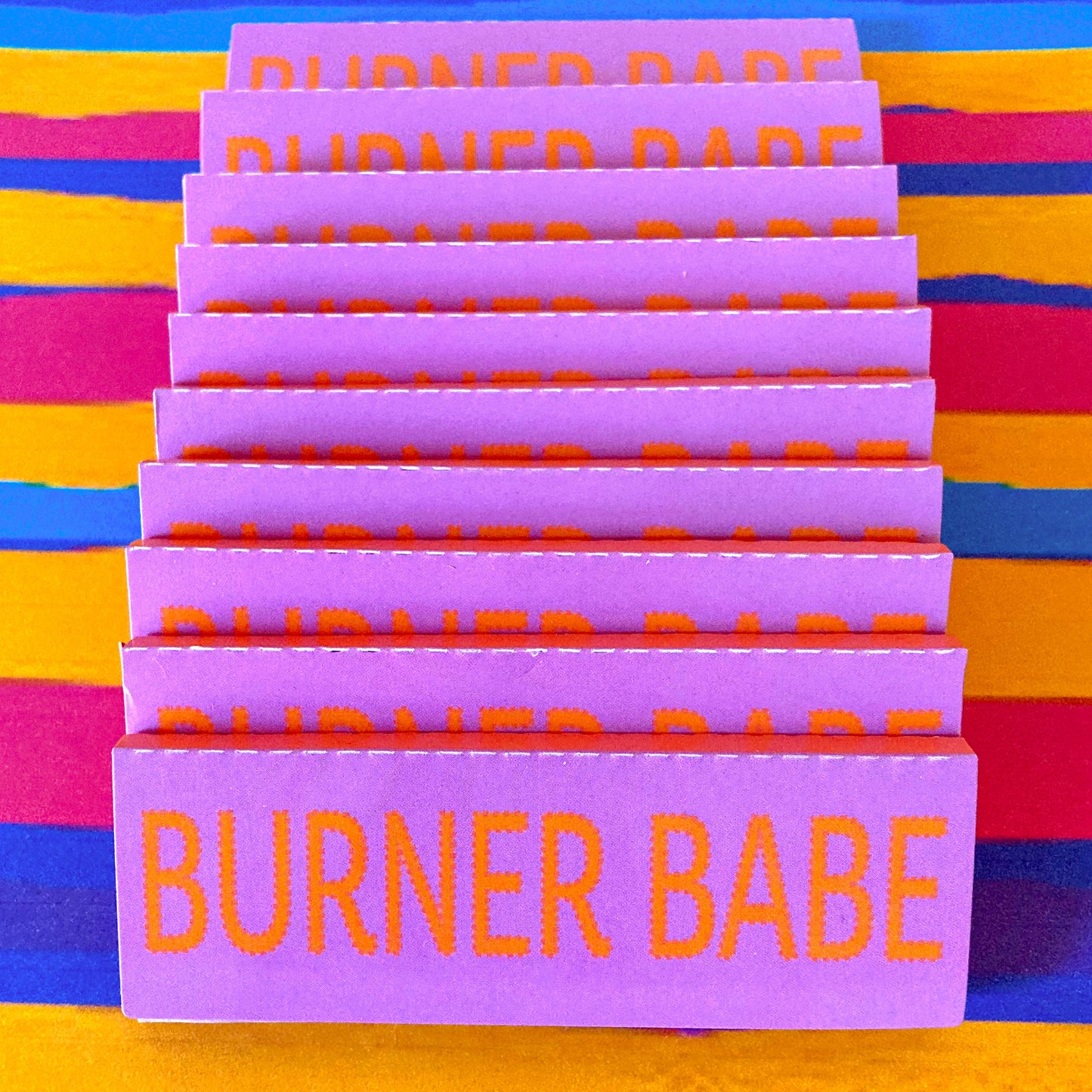 The Poppy Papers, set of 10: yellow poppy printed papers. These designer rolling papers are girly, pretty, vegan, cute, cool, standard size, high quality, even burn, natural dyes, best tasting, slow burn.