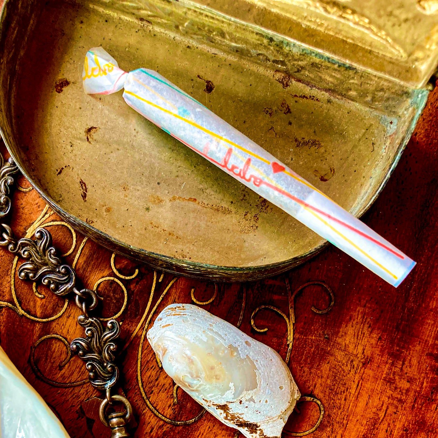The Postscript Papers: "babe" and heart adorned rolling papers. These designer rolling papers are girly, pretty, vegan, cute, cool, standard size, high quality, even burn, natural dyes, best tasting, slow burn.