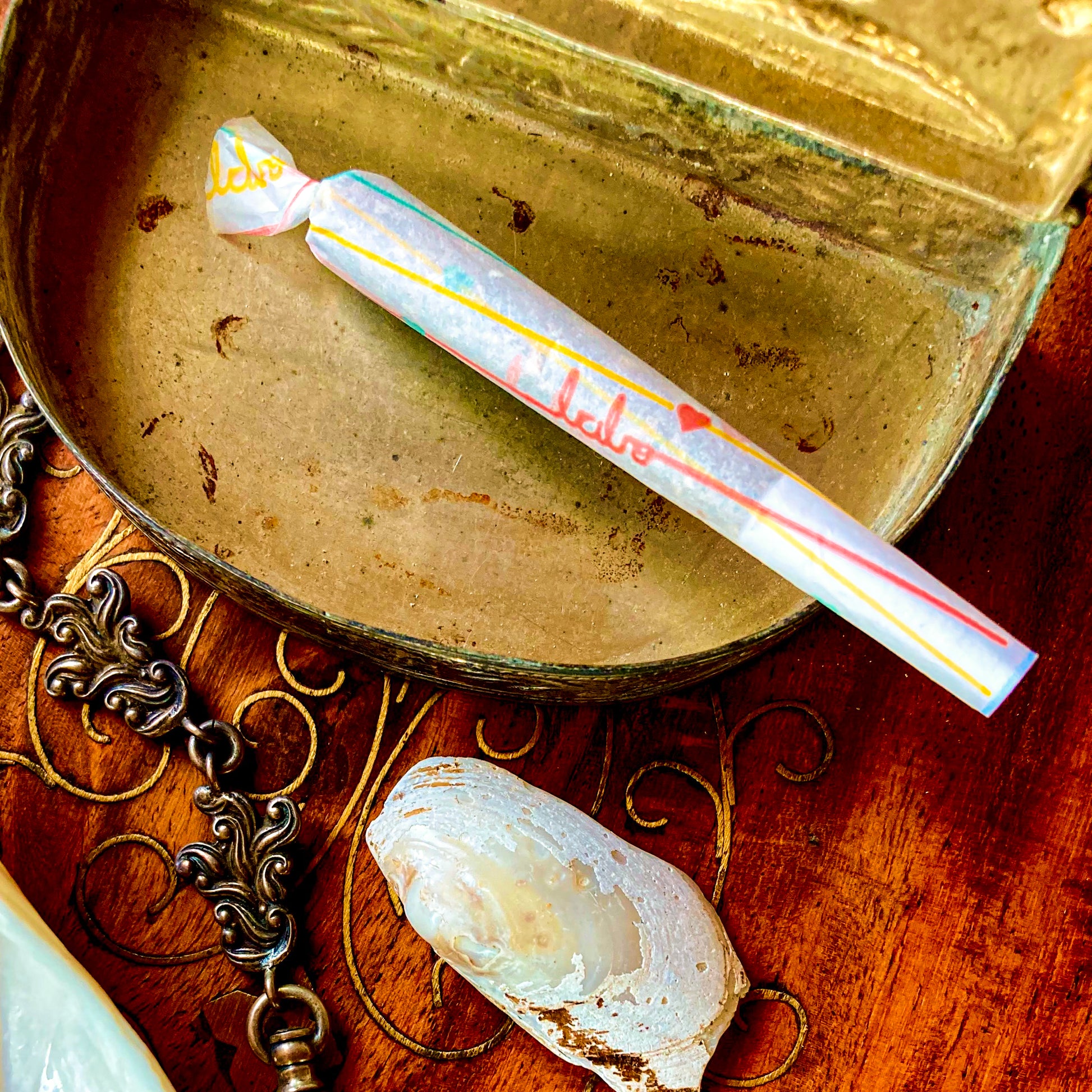 The Postscript Papers: "babe" and heart adorned rolling papers. These designer rolling papers are girly, pretty, vegan, cute, cool, standard size, high quality, even burn, natural dyes, best tasting, slow burn.