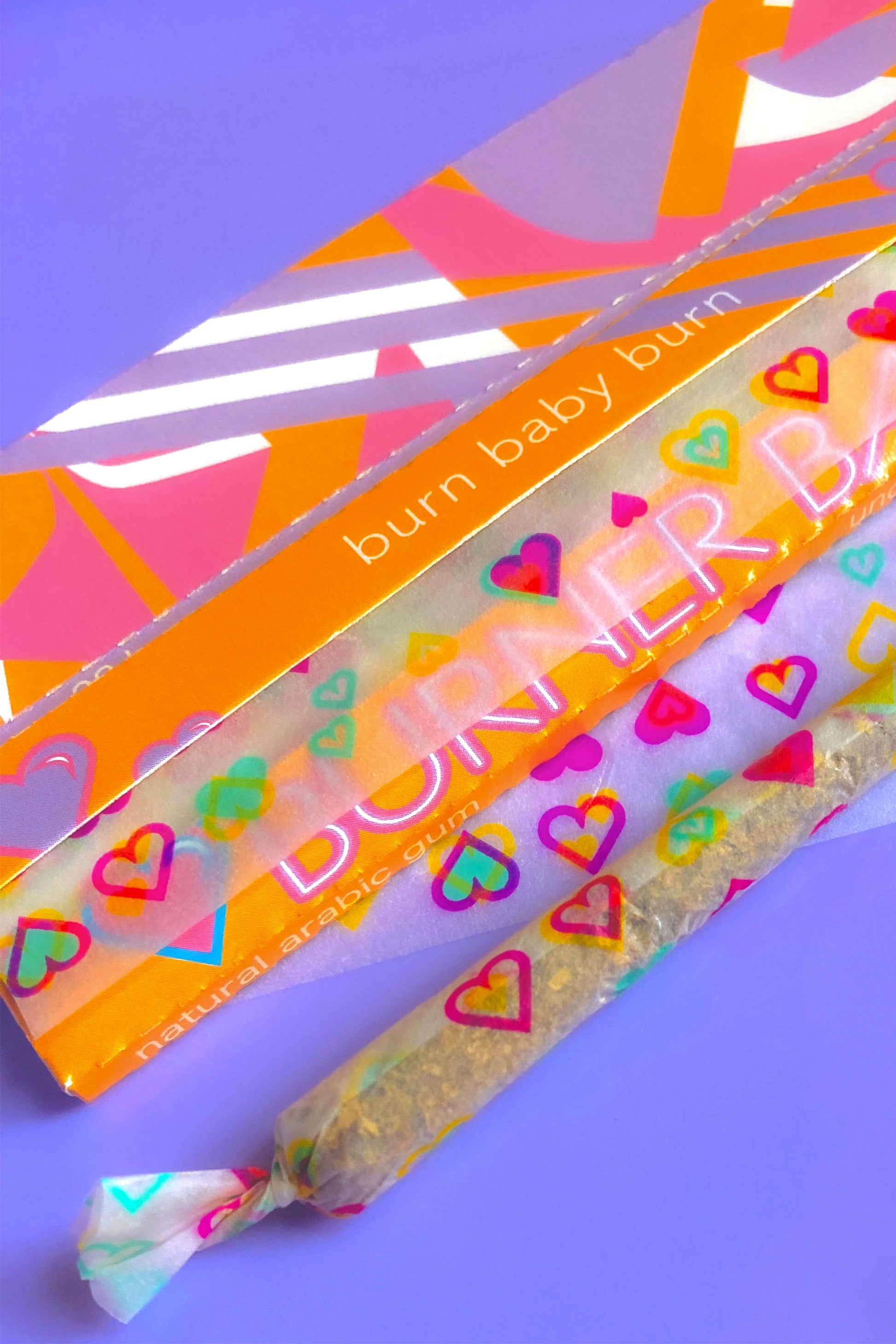 The Sweetheart Papers, set of 10: Major Babe size heart printed rolling papers. These designer papers are girly, pretty, vegan, cute, cool, king size, high quality, even burn, natural dyes, best tasting, slow burn.