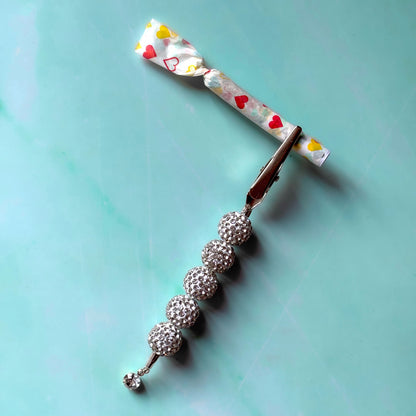 The Glitter J Clip
