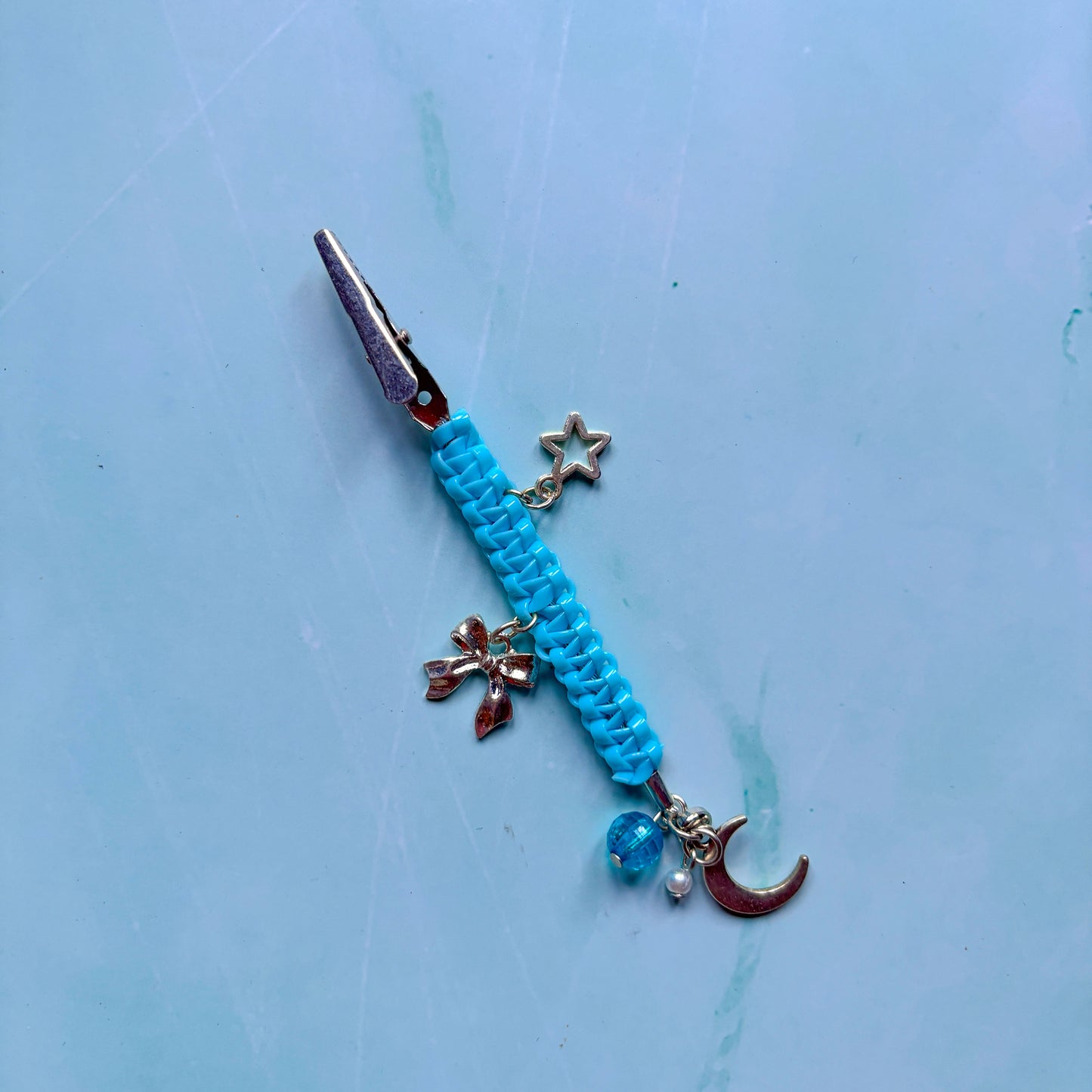 Blue Charmed J Clip