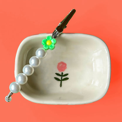 The Flower Girl J Clip