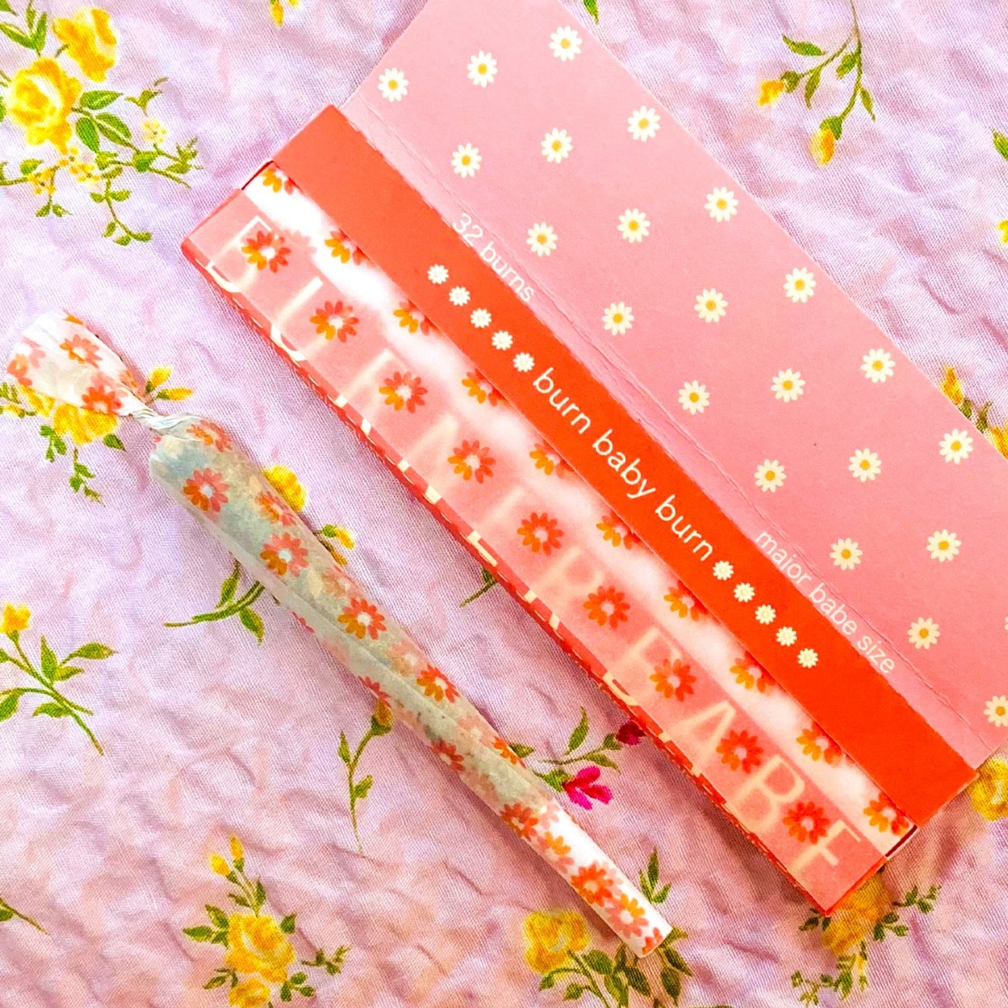 The Big Fleurt Papers, set of 10: Major Babe size pink and orange floral rolling papers. These designer papers are girly, pretty, vegan, cute, cool, king size, high quality, even burn, natural dyes, best tasting, slow burn.
