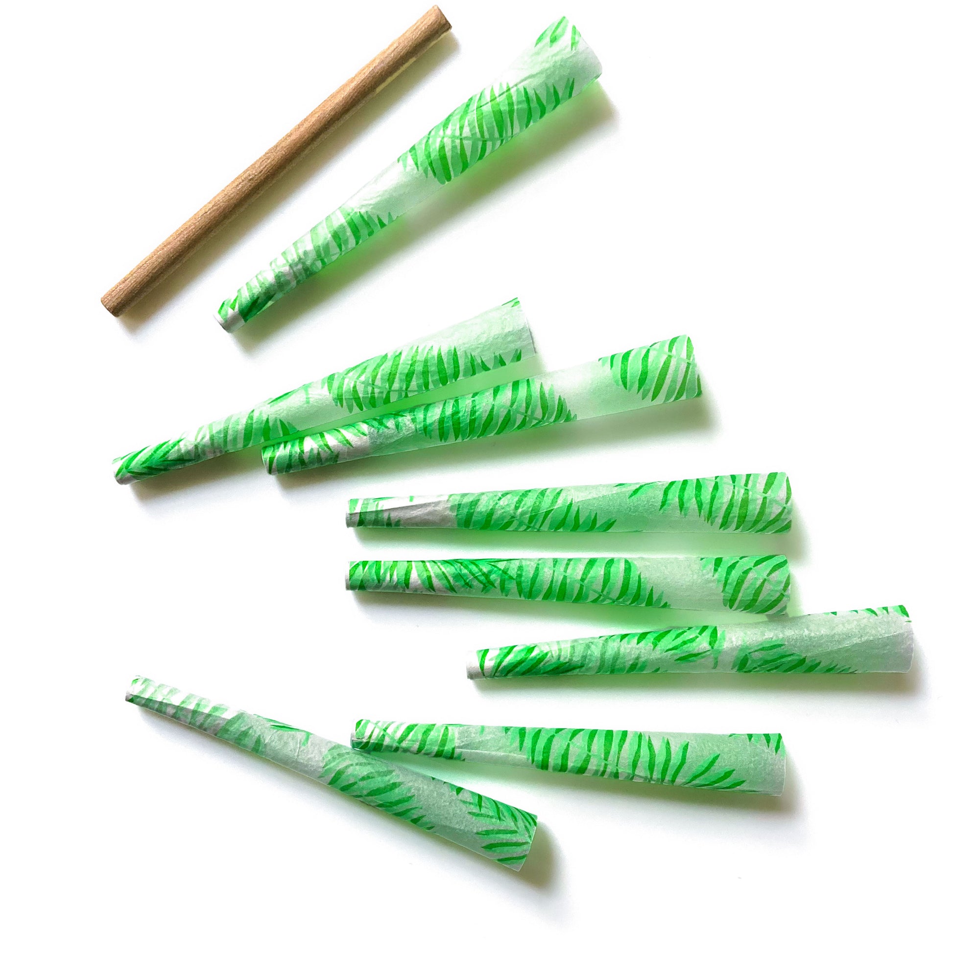 The Flaunt Cones, set of 8: leaf, frond patterned pre-rolled cones. These designer pre-rolled cones are girly, pretty, vegan, cute, cool, standard size, high quality, even burn, natural dyes, best tasting, slow burn.