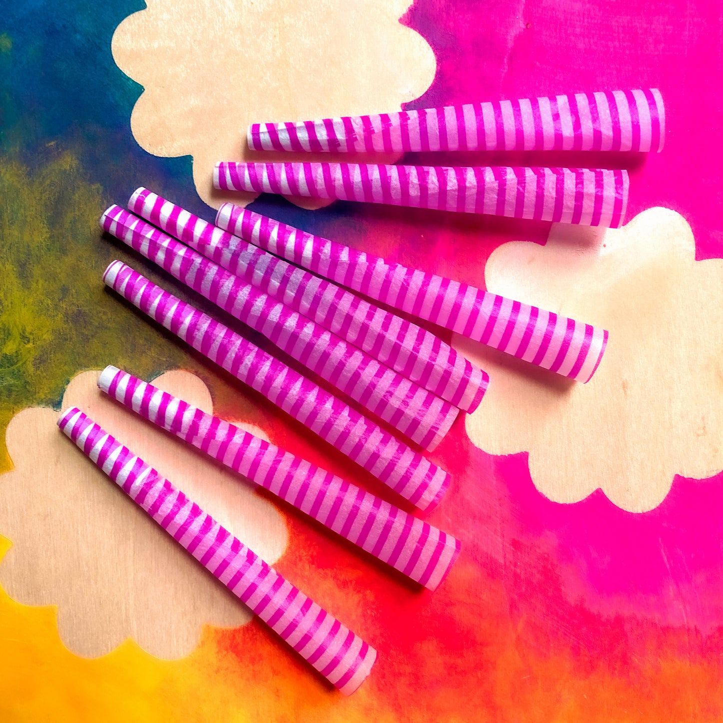 The Poseur Cones, set of 8: magenta striped pre-rolled cones. These designer pre-rolled cones are girly, pretty, vegan, cute, cool, standard size, high quality, even burn, natural dyes, best tasting, slow burn.