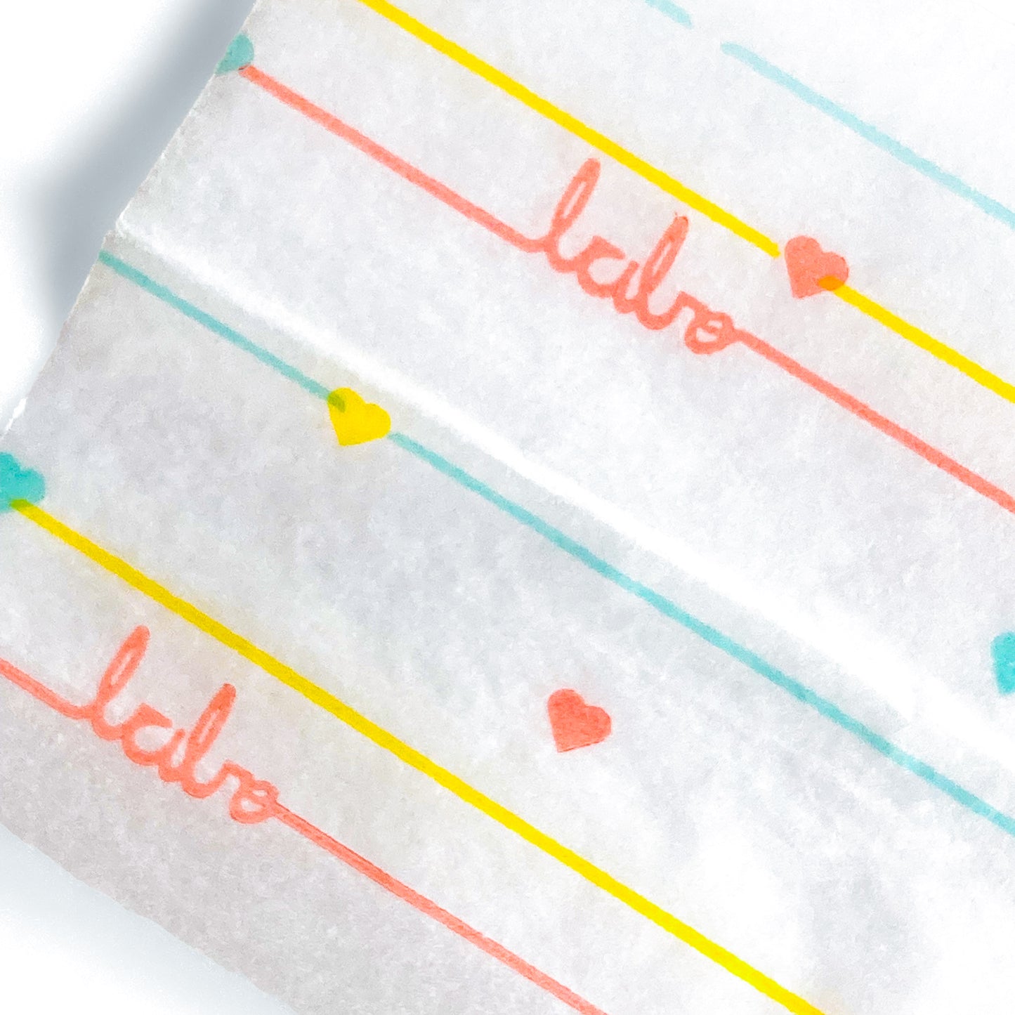 The Postscript Papers: "babe" and heart adorned rolling papers. These designer rolling papers are girly, pretty, vegan, cute, cool, standard size, high quality, even burn, natural dyes, best tasting, slow burn.