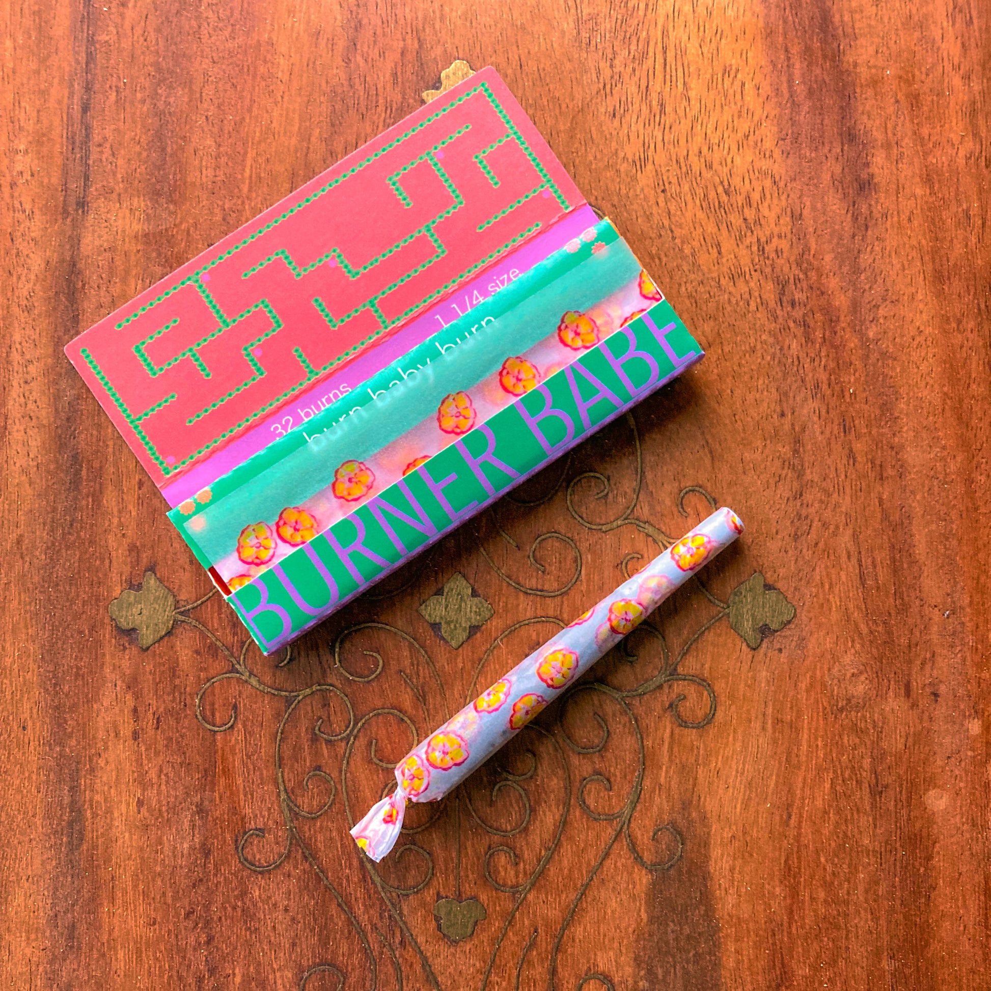The Poppy Papers: yellow poppy printed papers. These designer rolling papers are girly, pretty, vegan, cute, cool, standard size, high quality, even burn, natural dyes, best tasting, slow burn.
