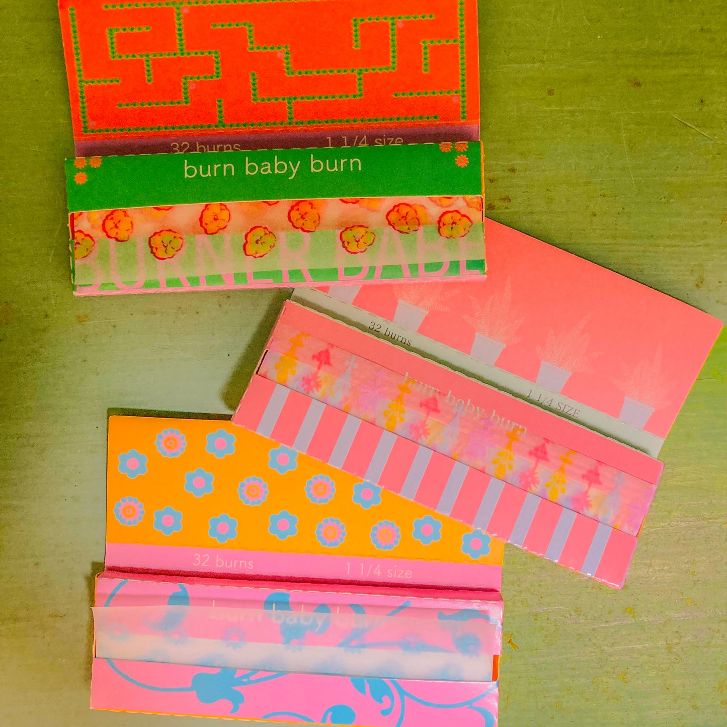 Set of three floral printed rolling papers. These designer rolling papers are girly, pretty, vegan, cute, cool, standard size, high quality, even burn, natural dyes, best tasting, slow burn.