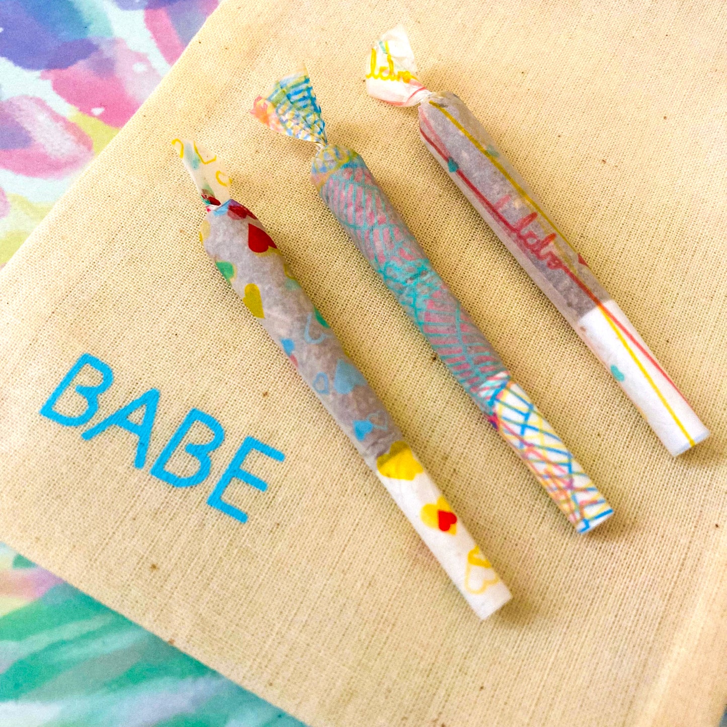 Set of 3 heart themed papers. These designer rolling papers are girly, pretty, vegan, cute, cool, standard size, high quality, even burn, natural dyes, best tasting, slow burn.