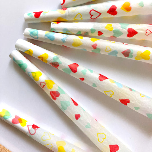 The (Ob)session Cones, set of 8: heart adorned pre-rolled cones. These designer pre-rolled cones are girly, pretty, vegan, cute, cool, standard size, high quality, even burn, natural dyes, best tasting, slow burn.