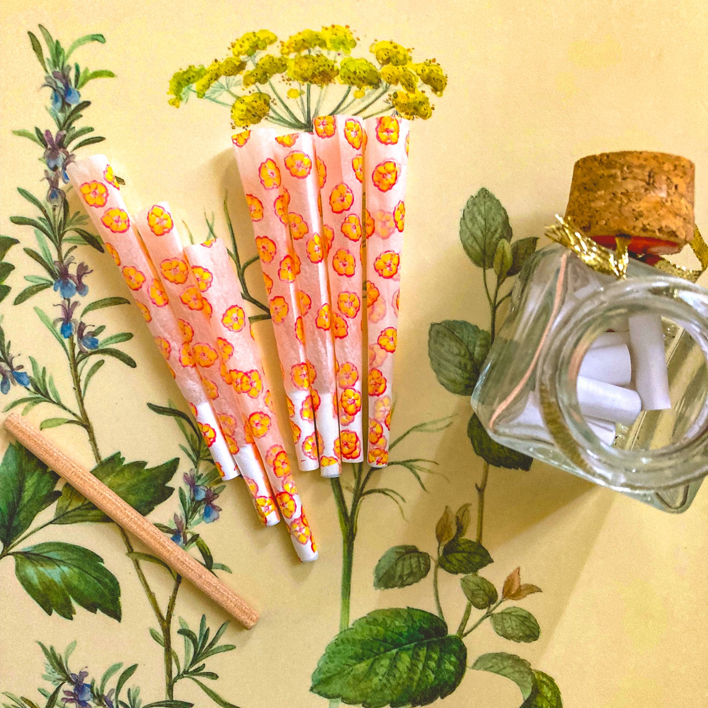 The Poppy Cones, set of 8 pre-rolled cones: yellow poppy printed cones. These designer pre-rolled cones are girly, pretty, vegan, cute, cool, standard size, high quality, even burn, natural dyes, best tasting, slow burn.
