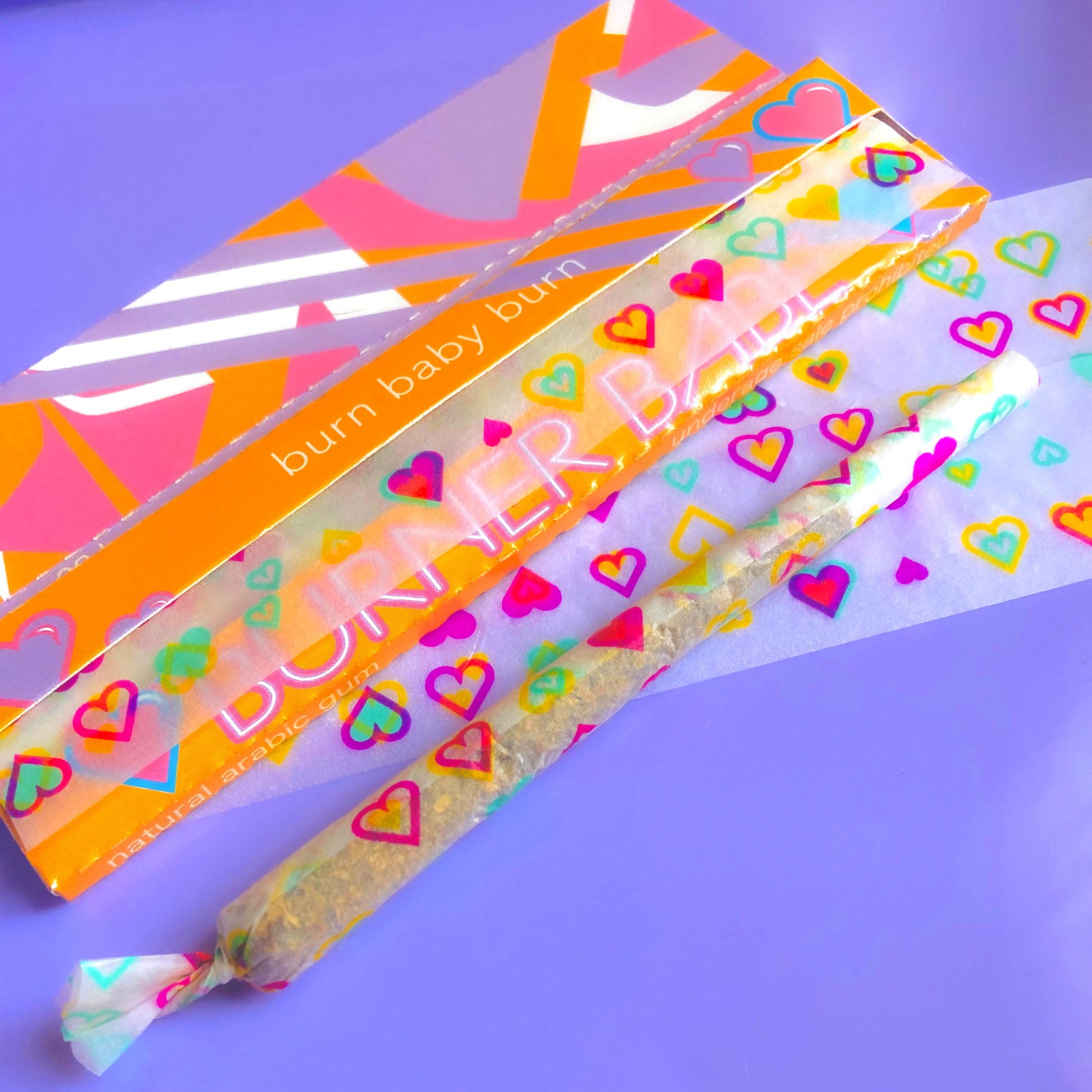 The Sweetheart Papers: Major Babe size heart printed rolling papers. These designer papers are girly, pretty, vegan, cute, cool, king size, high quality, even burn, natural dyes, best tasting, slow burn.