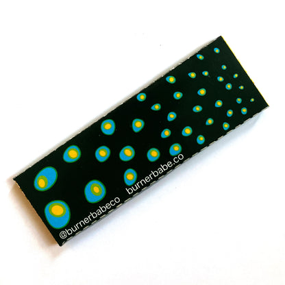 The Starlit Papers: star, moon, galaxy patterned rolling papers. These designer rolling papers are girly, pretty, vegan, cute, cool, standard size, high quality, even burn, natural dyes, best tasting, slow burn.