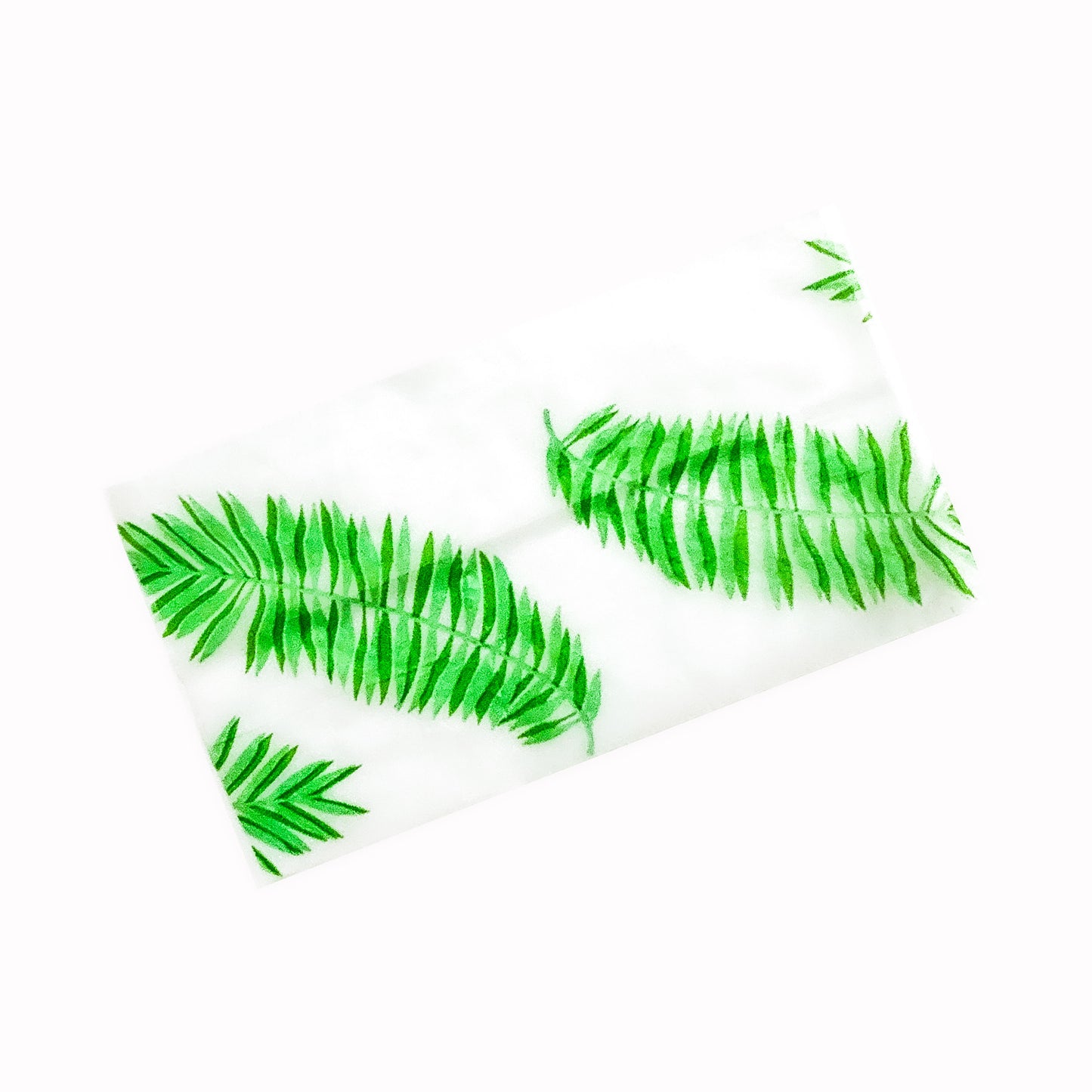 The Flaunt Rolling Papers, set of 10: bright green leaf, frond patterned rolling papers. These designer rolling papers are girly, pretty, vegan, cute, cool, standard size, high quality, even burn, natural dyes, best tasting, slow burn.