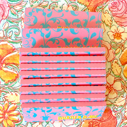 pollyanna papers, set of 10 : blue flower papers. These designer rolling papers are girly, pretty, vegan, cute, cool, standard size, high quality, even burn, natural dyes, best tasting, slow burn. 